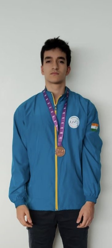 Rayhan in India team kit with medal